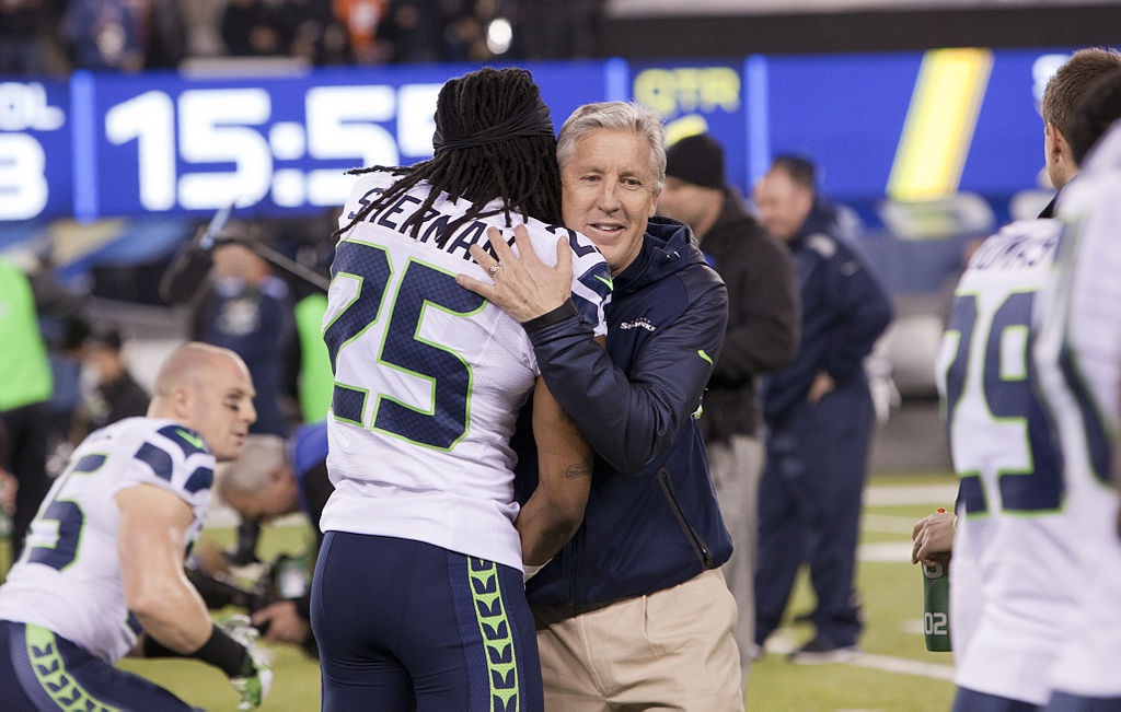 richard_sherman_and_pete_carroll_in_embrace_super_bowl_xlviii1.jpg