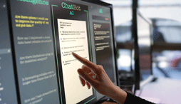 Close up of a hand interacting with an AI prompt on a computer screen