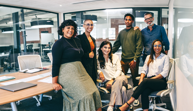 An ethnically diverse group of young professionals in an office